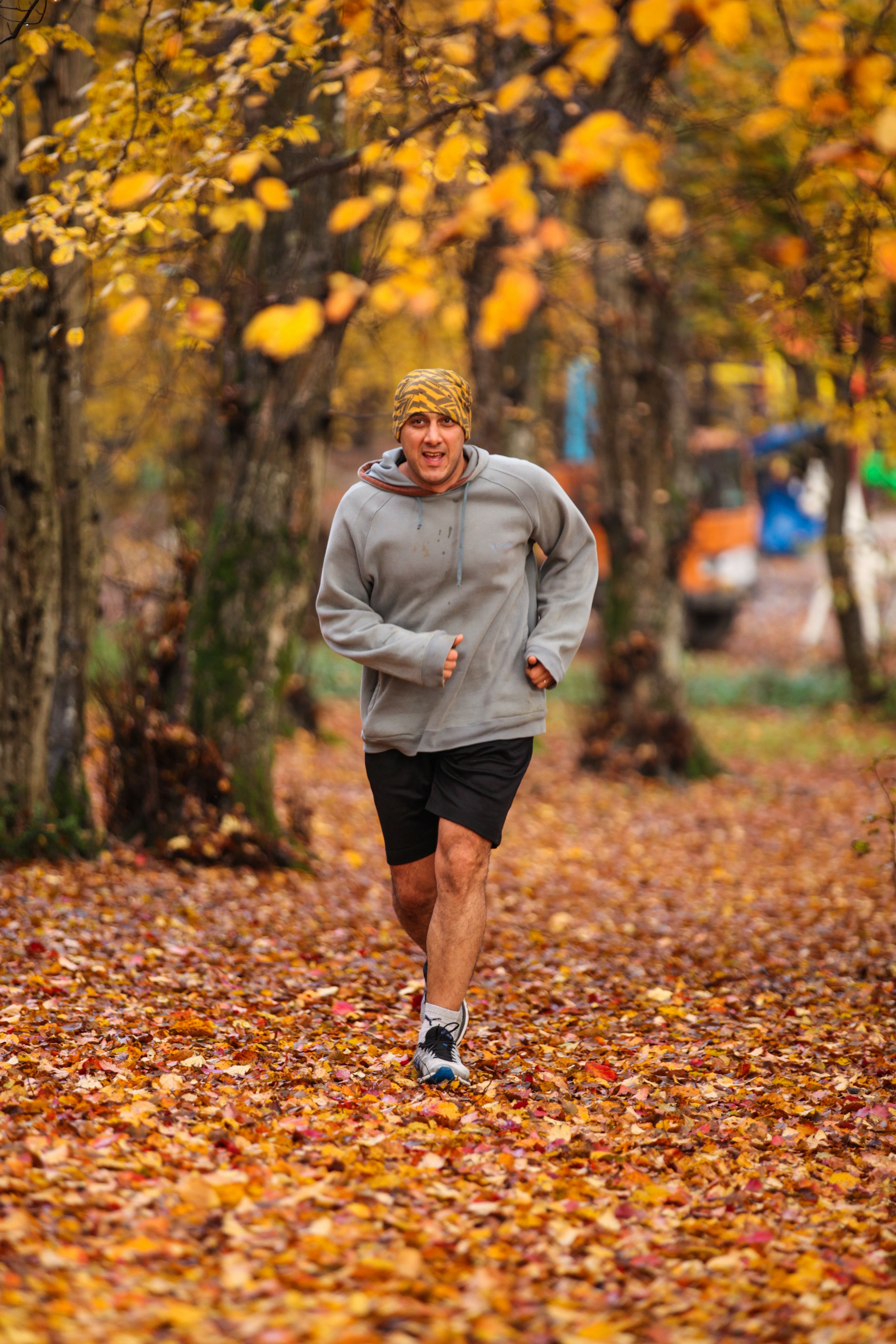 Man running in fall park