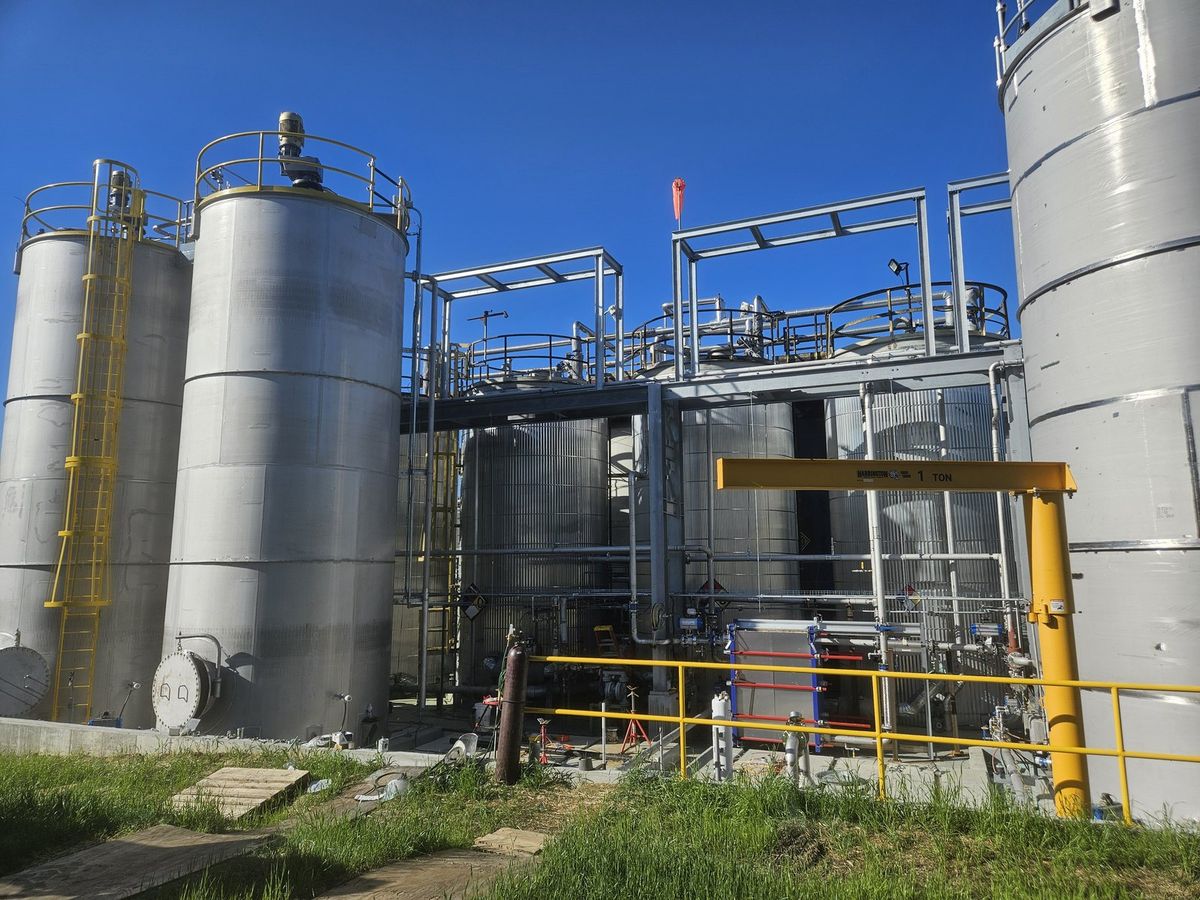 Storage tanks and silos outside a Koppers treating plant