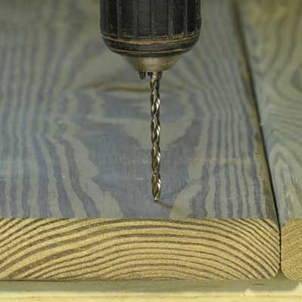 drill entering deck board