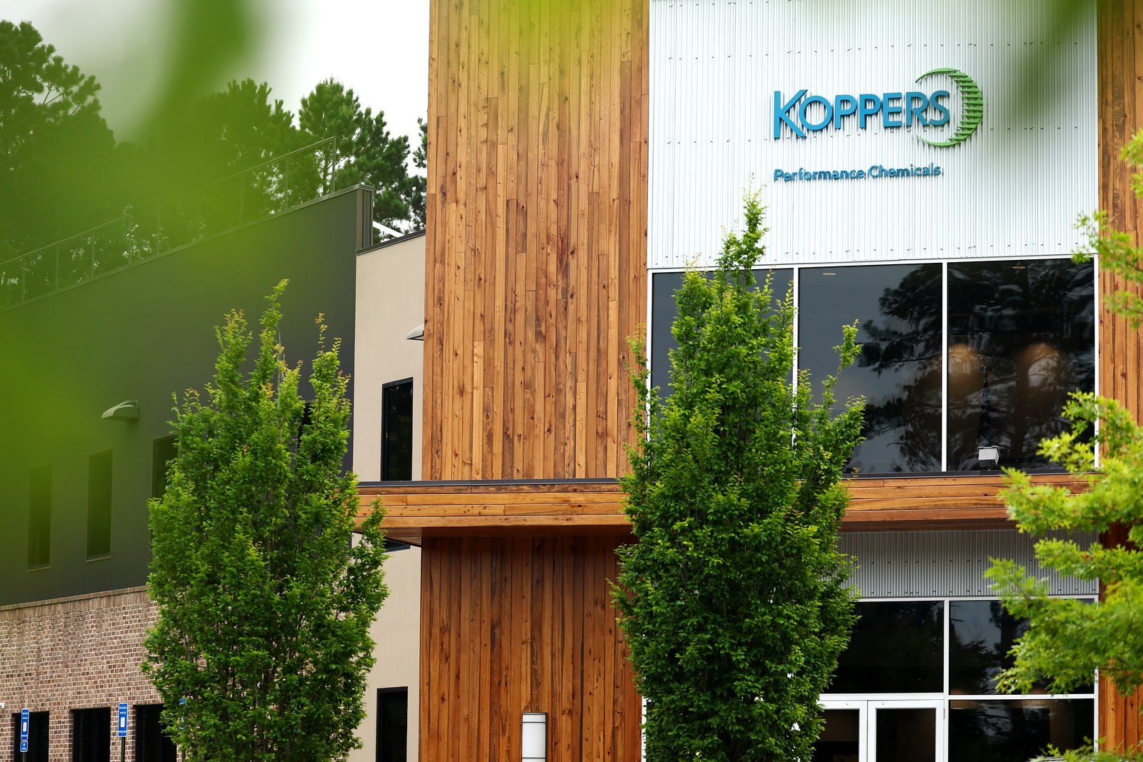 A Koppers Performance Chemicals treating facility among the trees