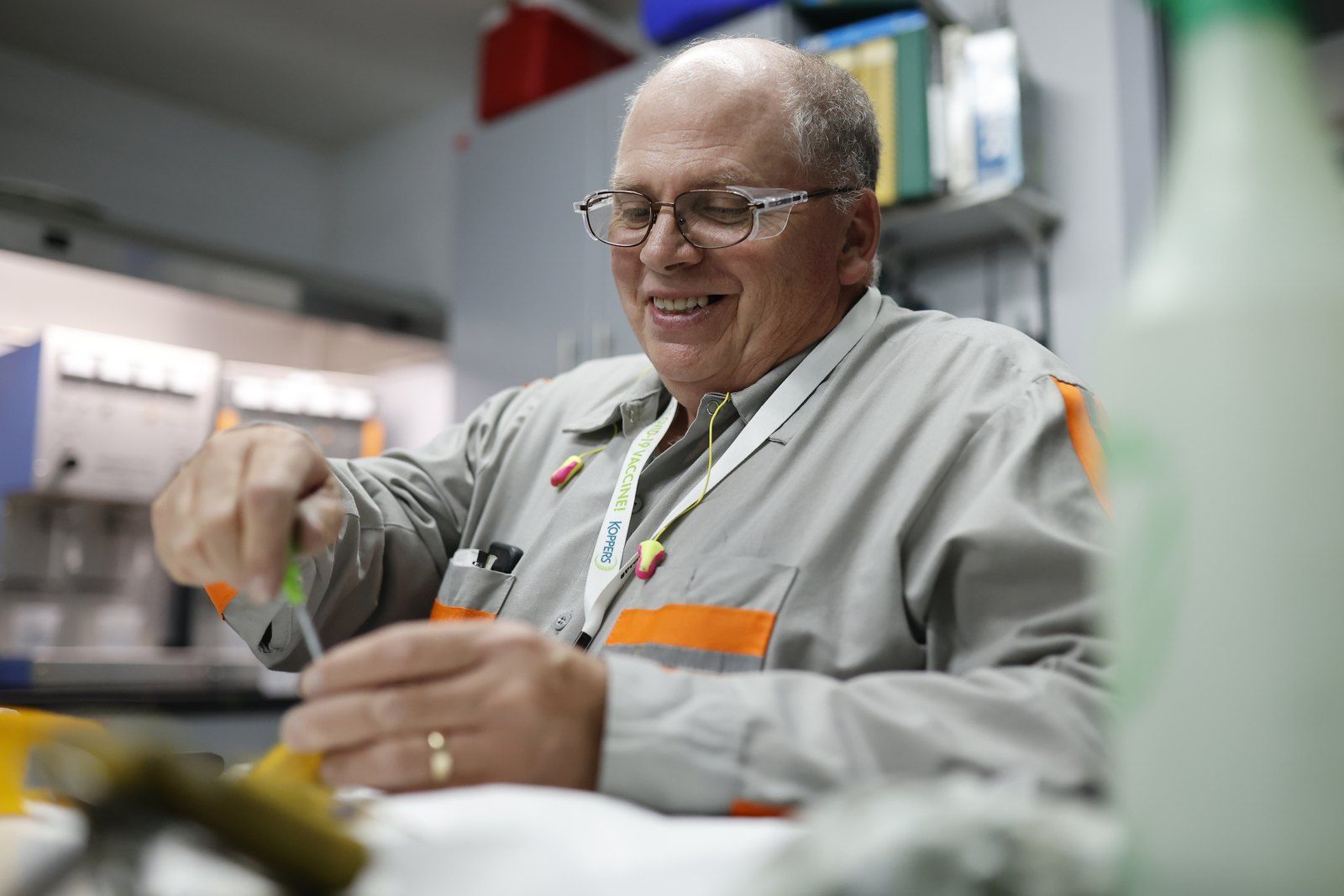 Koppers analyst working with a sample at the lab bench