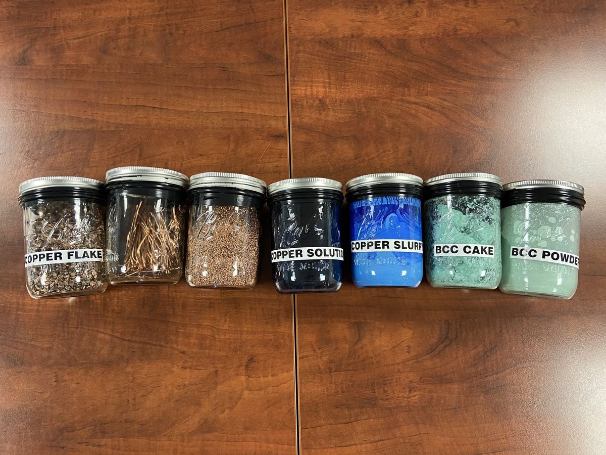 Labelled jars showing each stage of copper preservative production