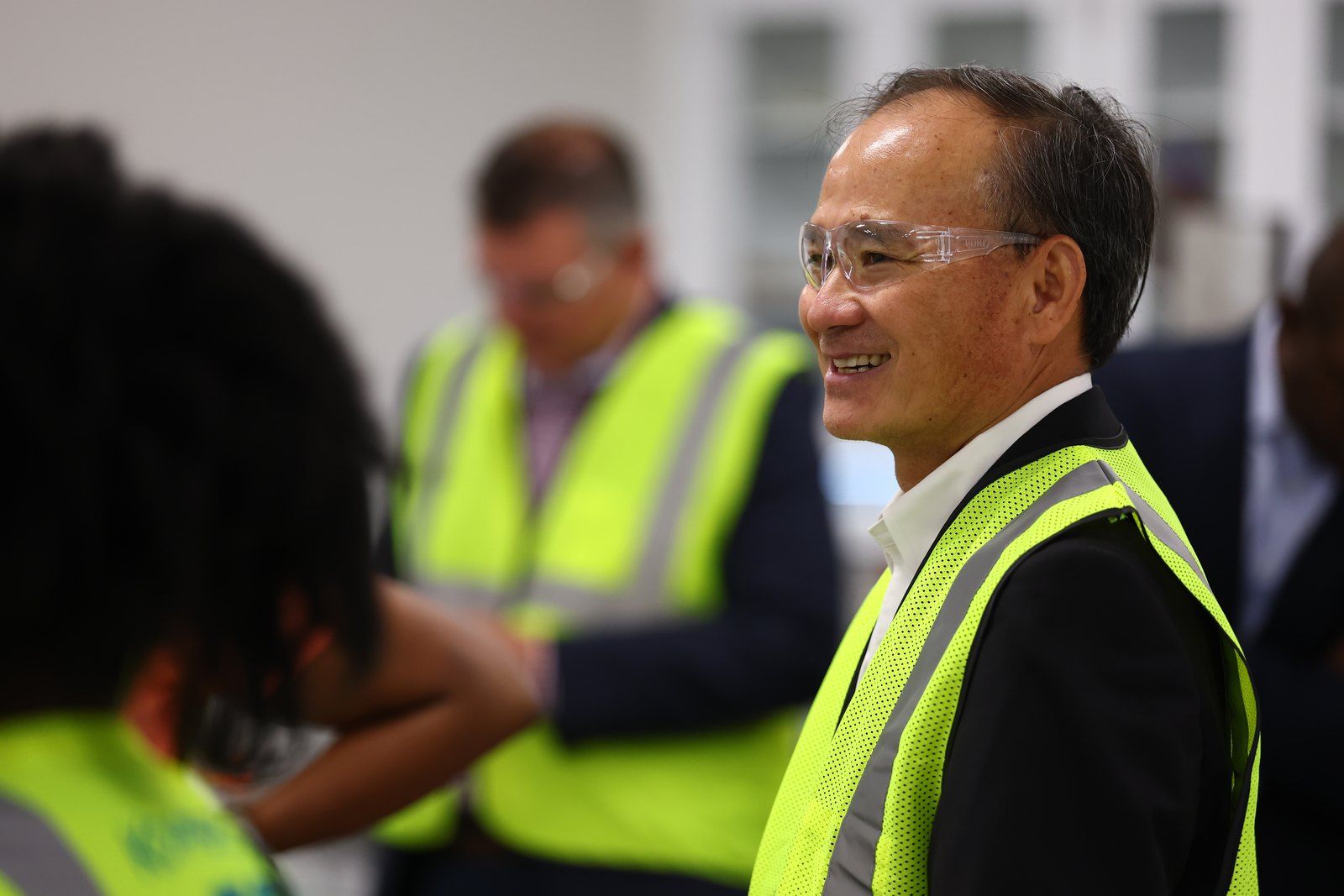 Koppers leader in a safety vest during a facility tour