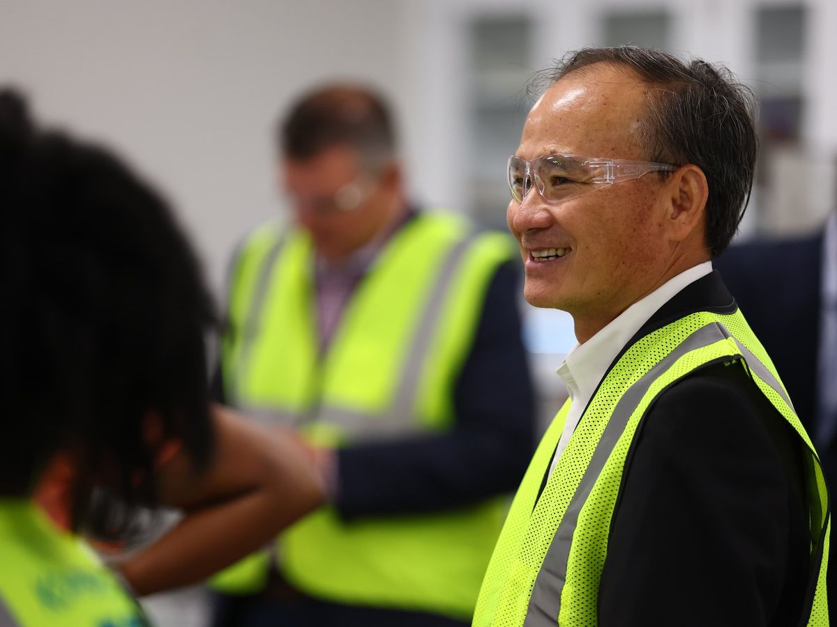 Koppers leader in a safety vest during a facility tour