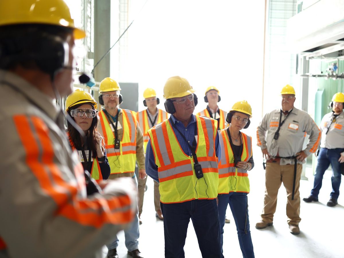 Koppers technical staff briefing a plant crew
