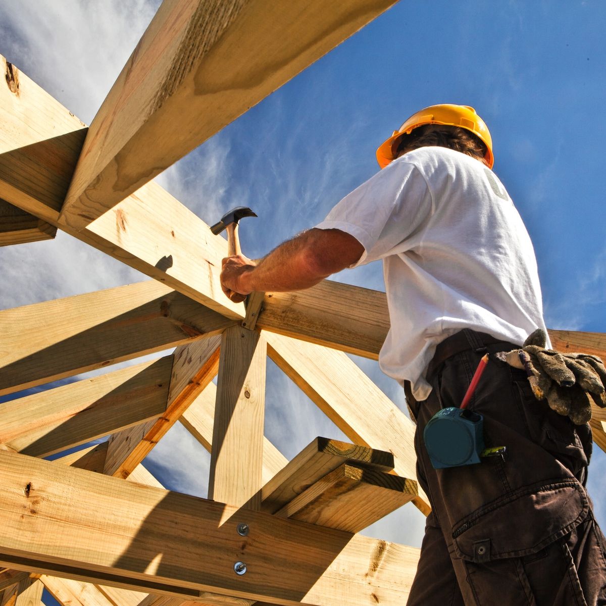 Builder Working on House Frame