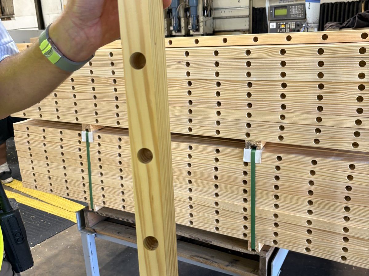 Pre-drilled deck balusters coming off the production line