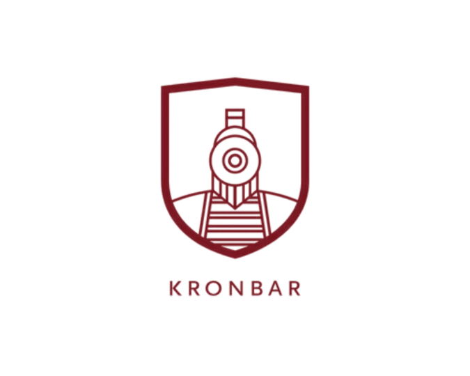 Logo i mørkerød farge som viser en tog i et skjold, med teksten «KRONBAR» under.