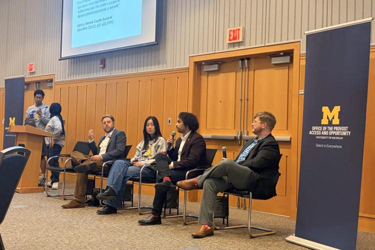 FIRE panelists and Open Inquiry fellows answering an audience question
