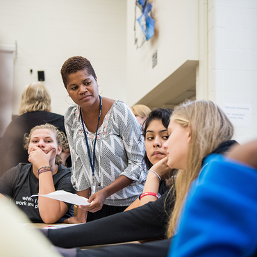 Students discussing Michigan PAUSE activity.