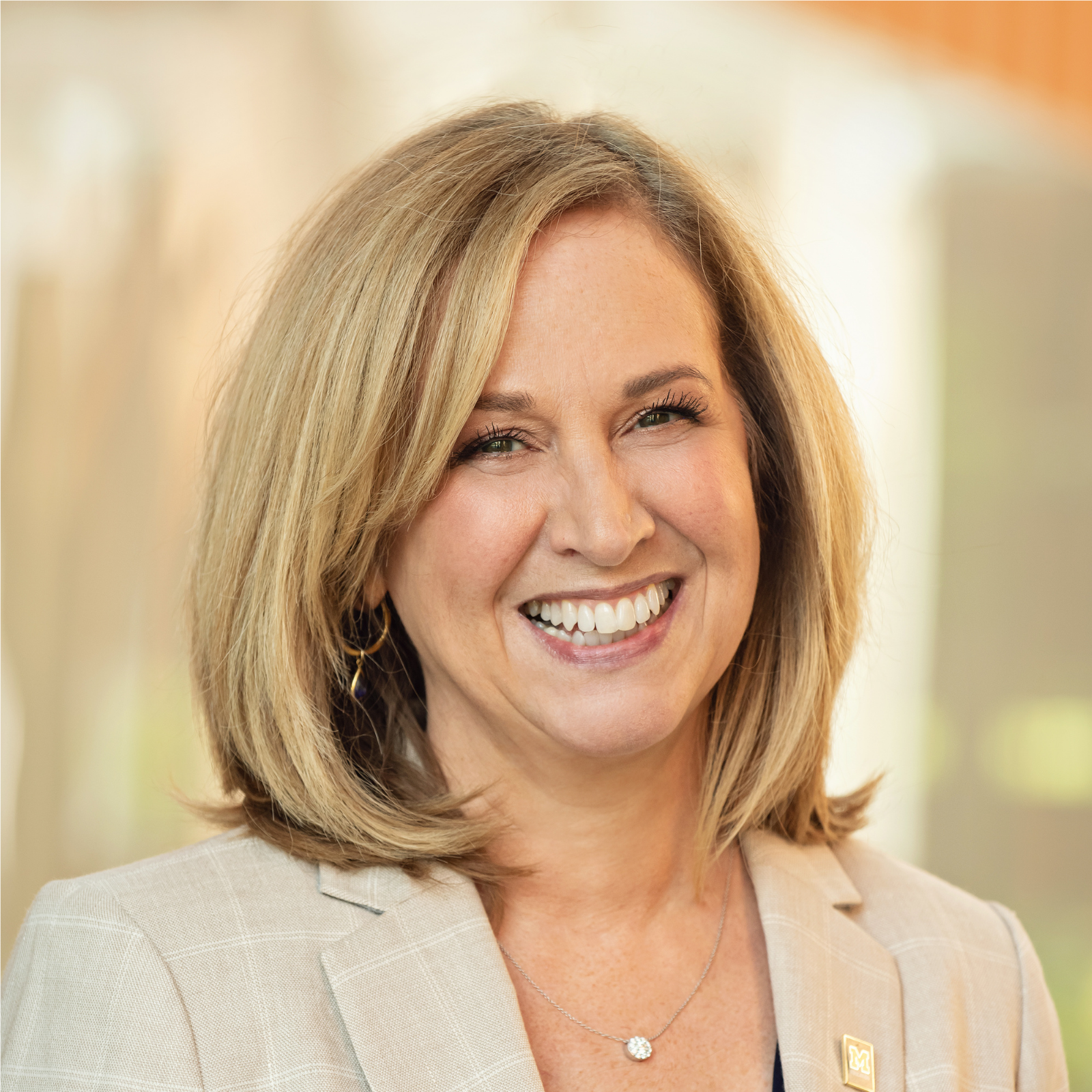 Elizabeth Birr Moje smiles whilst looking at the camera