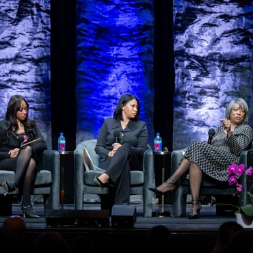 WCTF conference panelists on stage