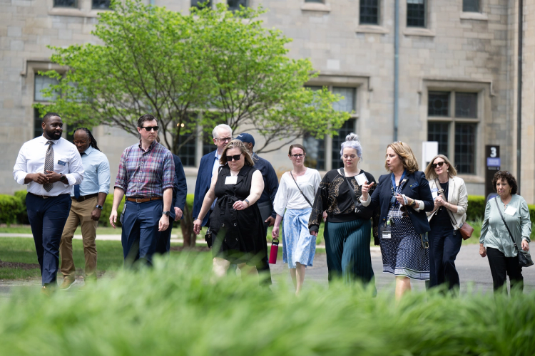 A group of ED Talk attendees take a tour of the historic Marygrove Learning Community campus in Detroit.