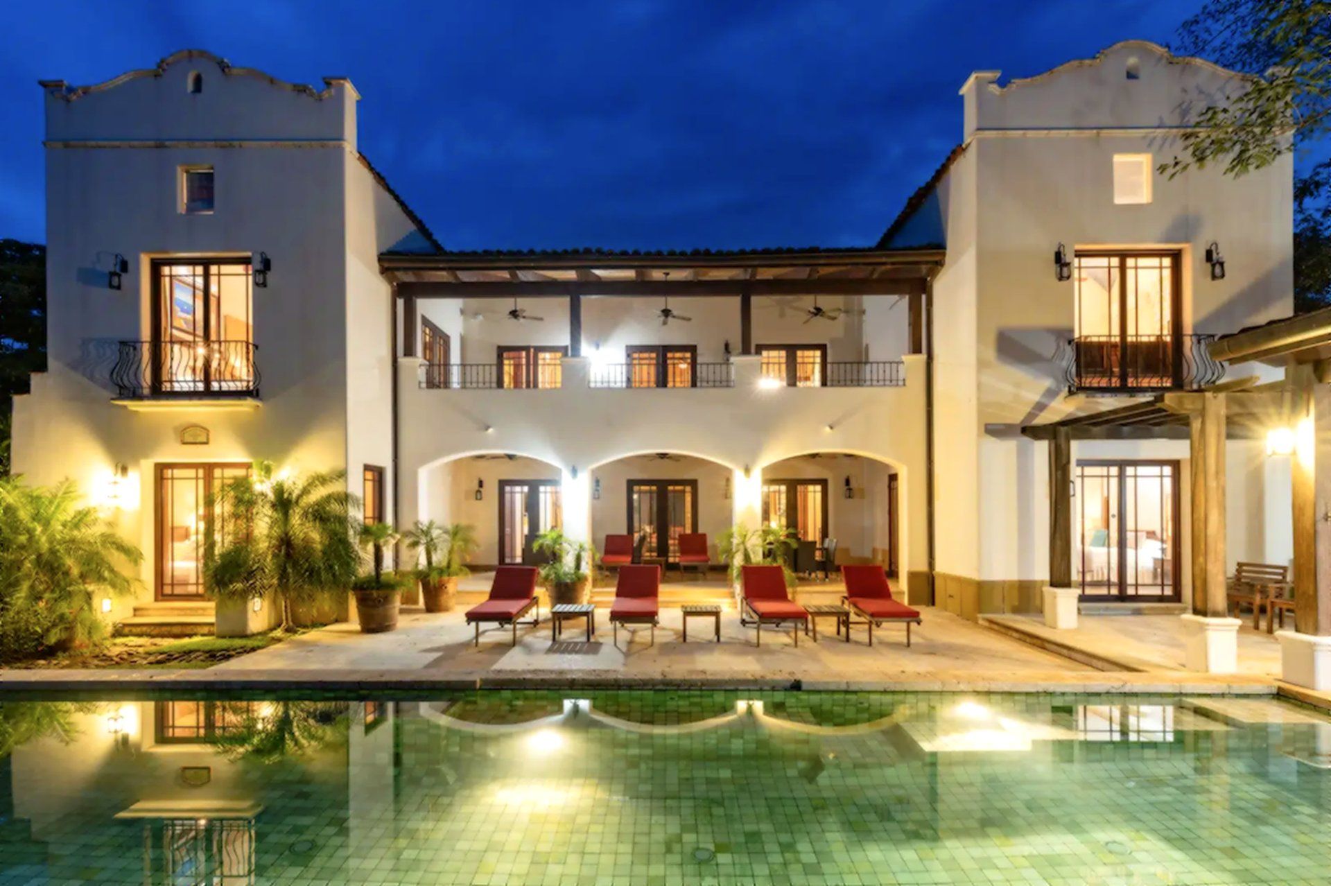 Casa Orquidea night villa pool reflection