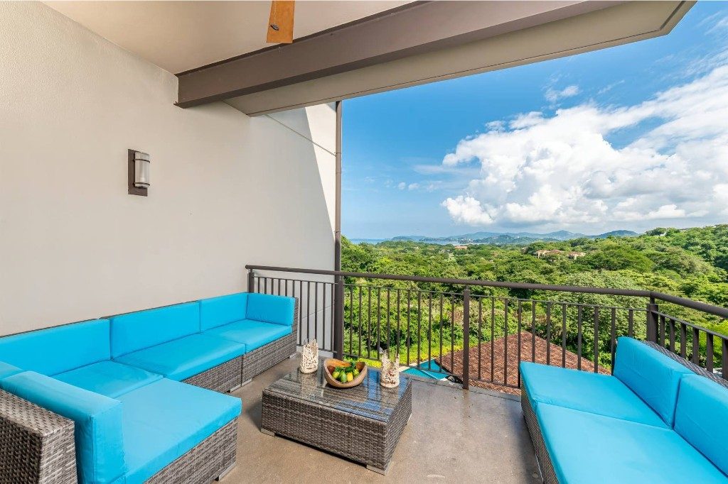 Terrace seating with ocean and valley views – Roble Sabana #301, Reserva Conchal, Guanacaste, Costa Rica