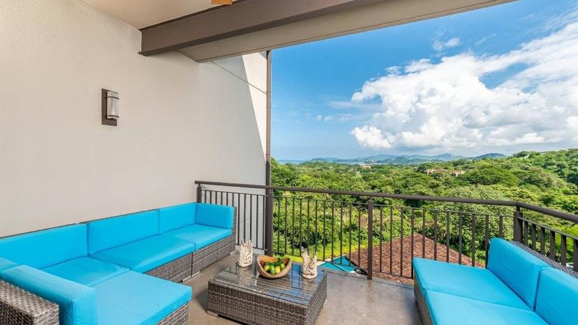 Terrace seating with ocean and valley views – Roble Sabana #301, Reserva Conchal, Guanacaste, Costa Rica