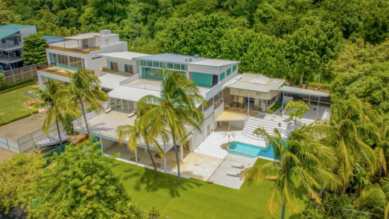 La Mansion aerial white mansion pool