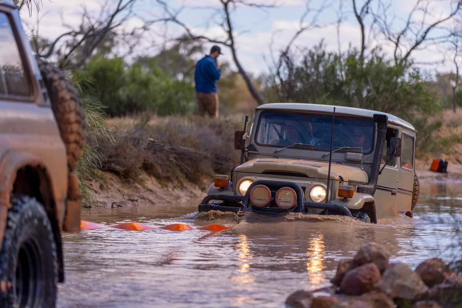 toyota 4wd being recovered from mud offroad