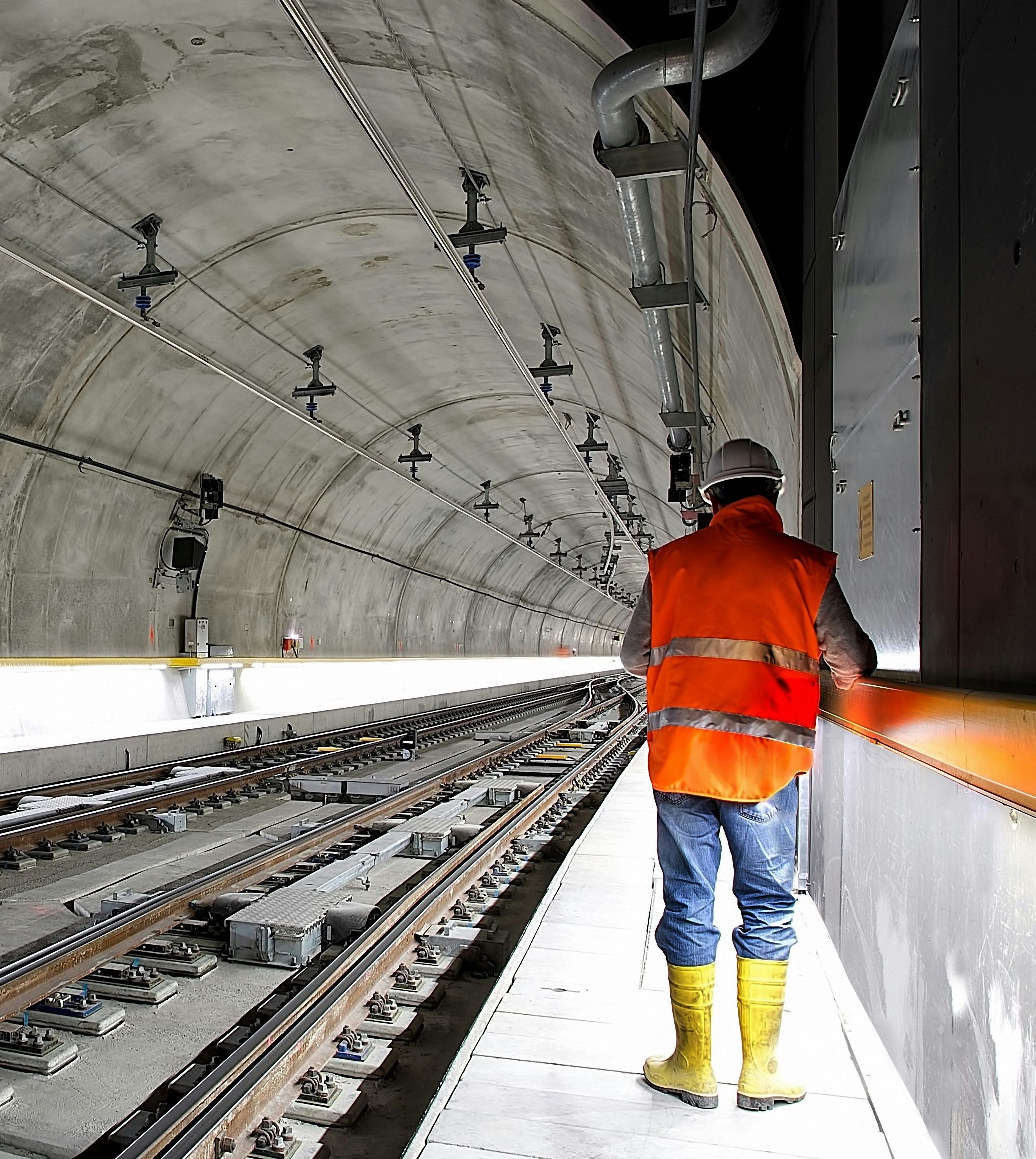 construction worker in rail tunnel