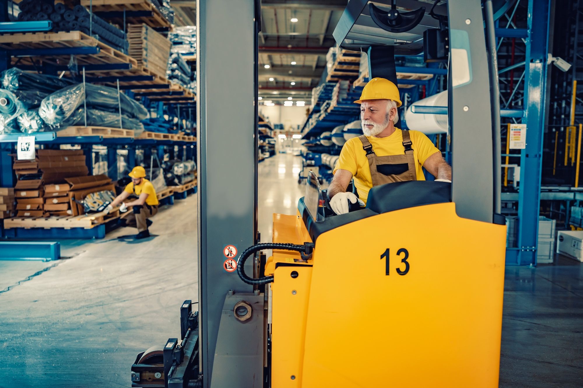 senior workers in warehouse