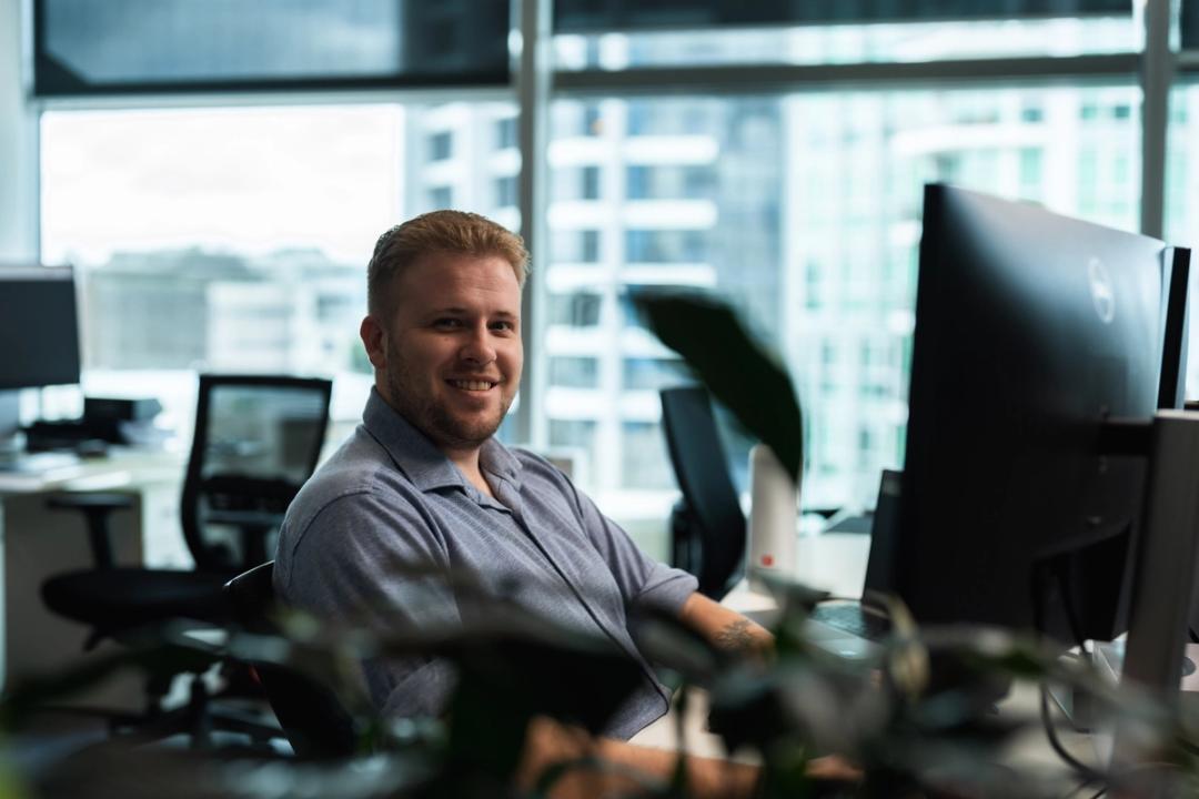 Colleague working at computer