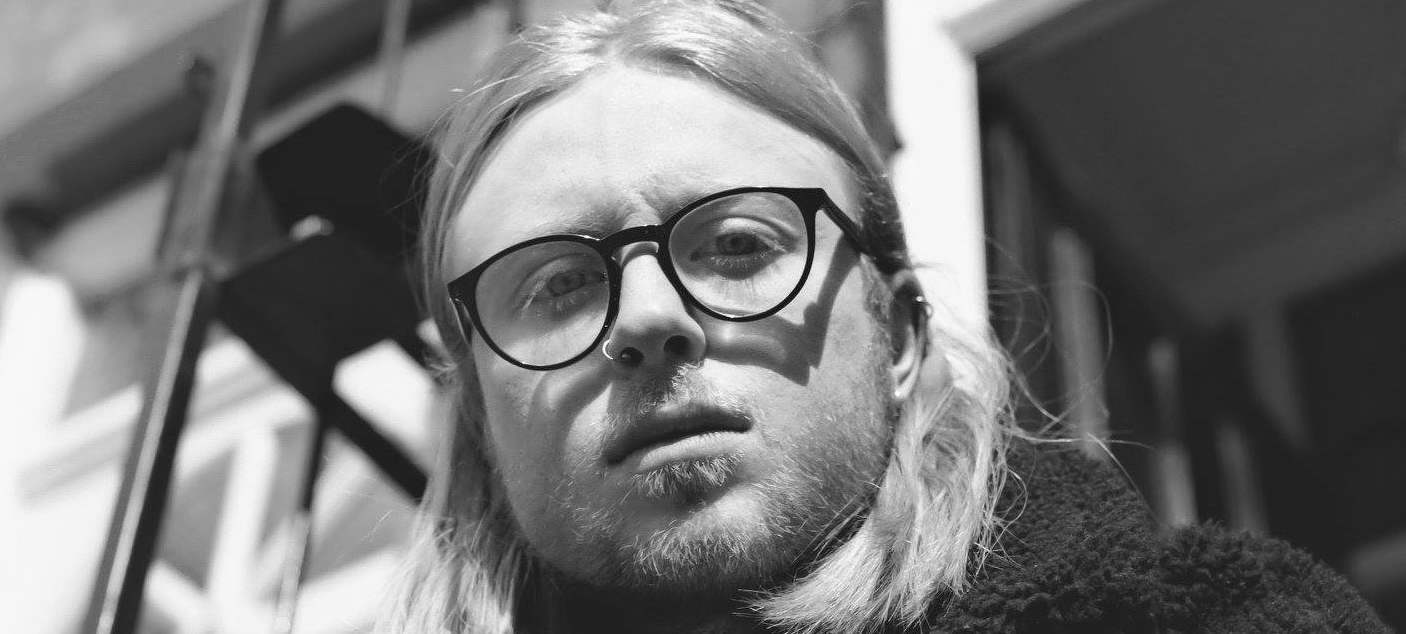 Tom Saunders (he/him)