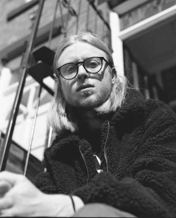 Tom Saunders (he/him)
