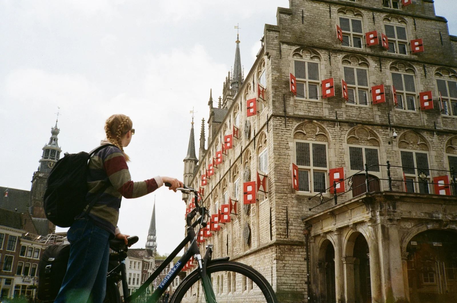 Portrait of a women and a bike in a town in the Netherlands