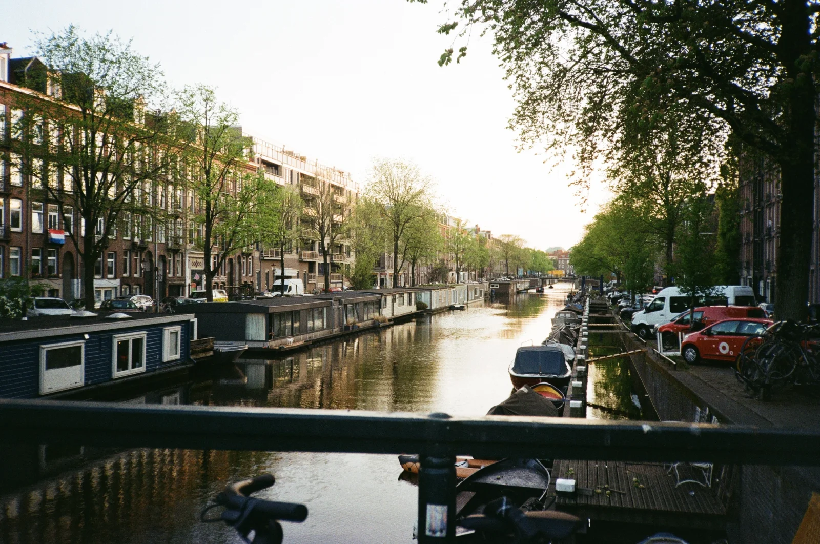Dutch canal in Amsterdam in sunset lighting