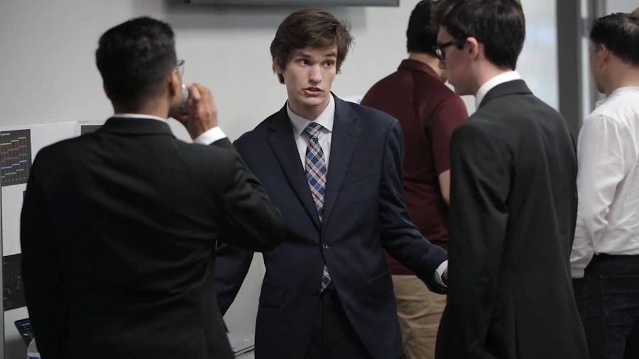 Members talking between presentations at Innovation Expo
