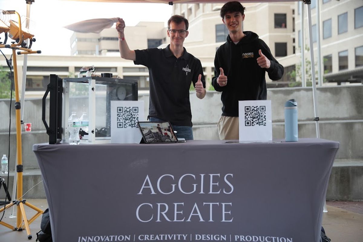 Aggies Create branded table at a campus event