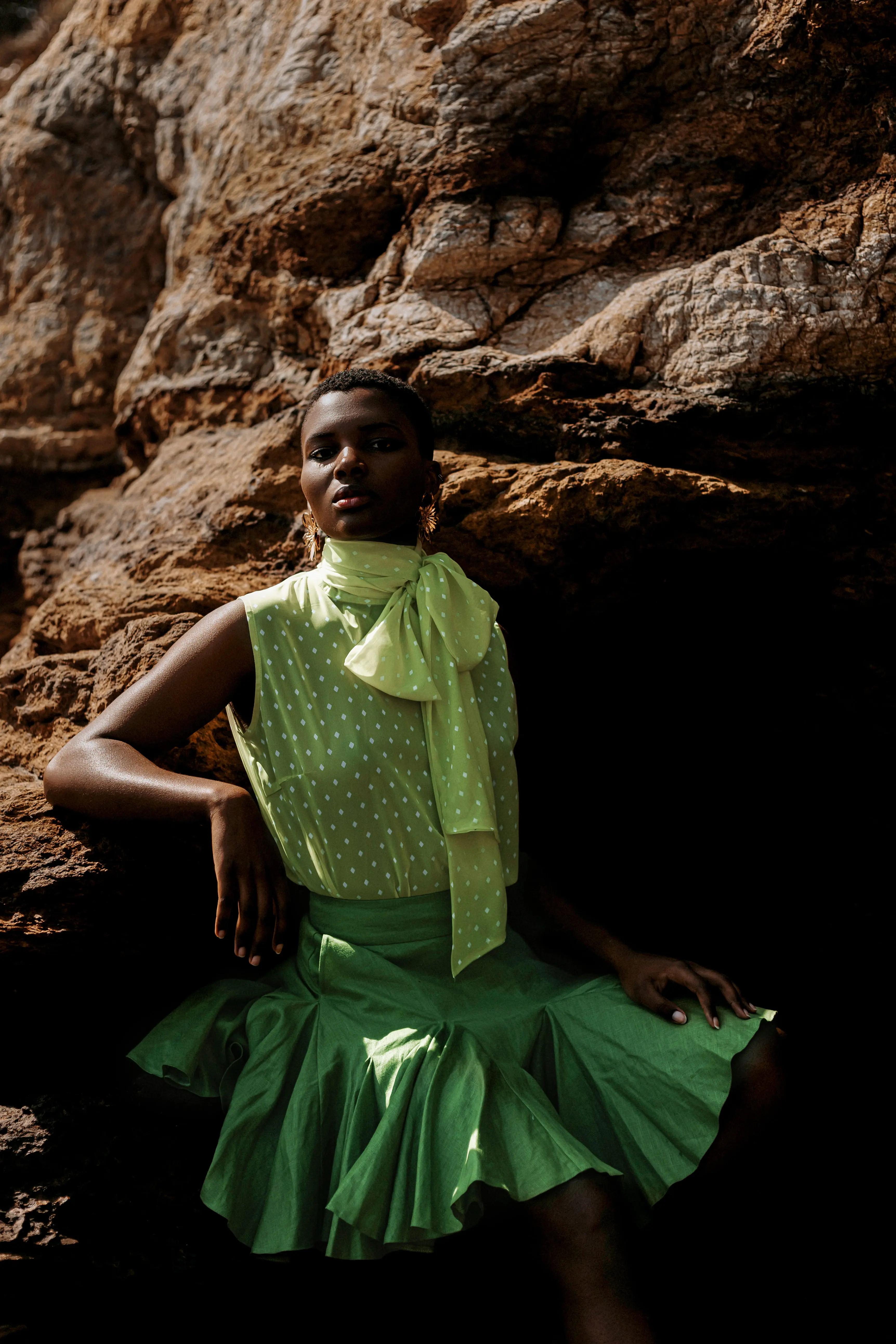 Outdoor model wearing a vintage green dress