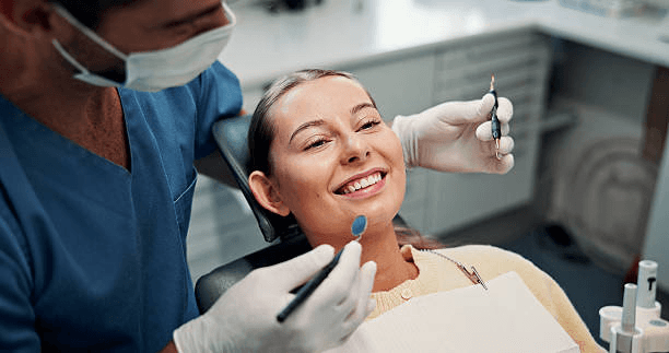 Smiling woman during a dental cleaning