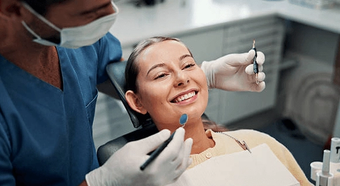 Smiling woman during a dental cleaning
