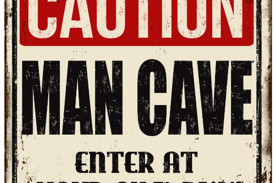 Weathered vintage metal sign with a red banner reading "Caution" above bold black text that reads "Man Cave, Enter at Your Own Risk!"