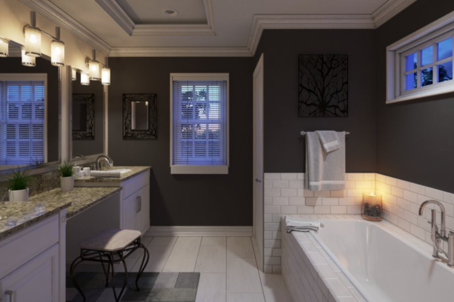 Bathroom with dark charcoal-brown walls, white subway tile around a soaking tub, granite-topped white vanities, and a folded towel hanging beside a window.