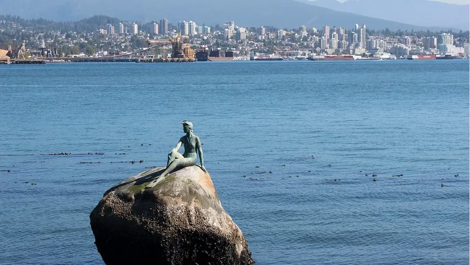 Girl in a wetsuit sculpture in Vancouver