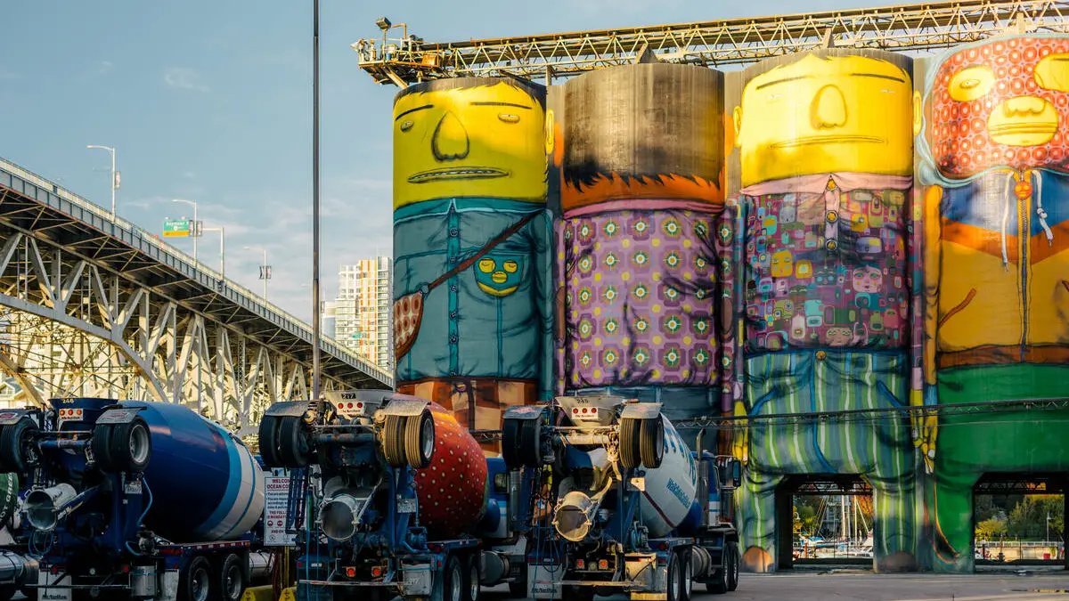 Giants mural on Granville Island by Os Gemeos