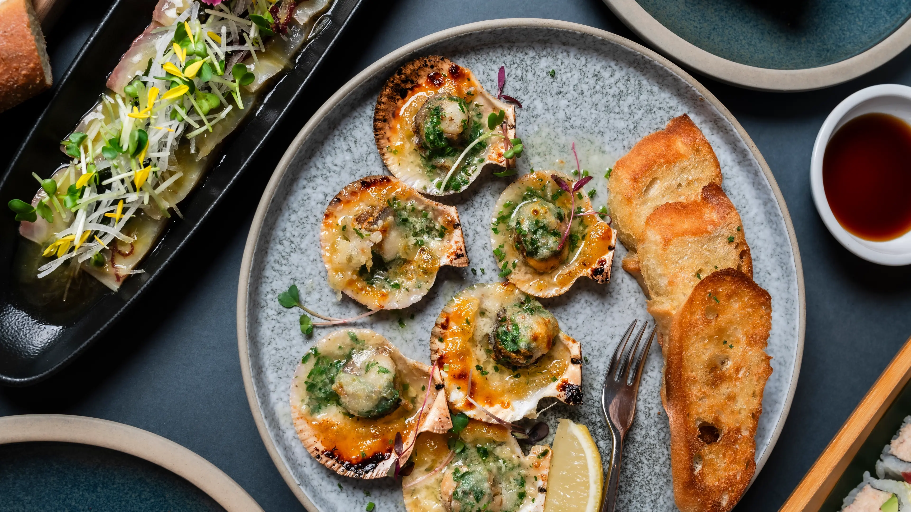 Happy hour dishes at Coast