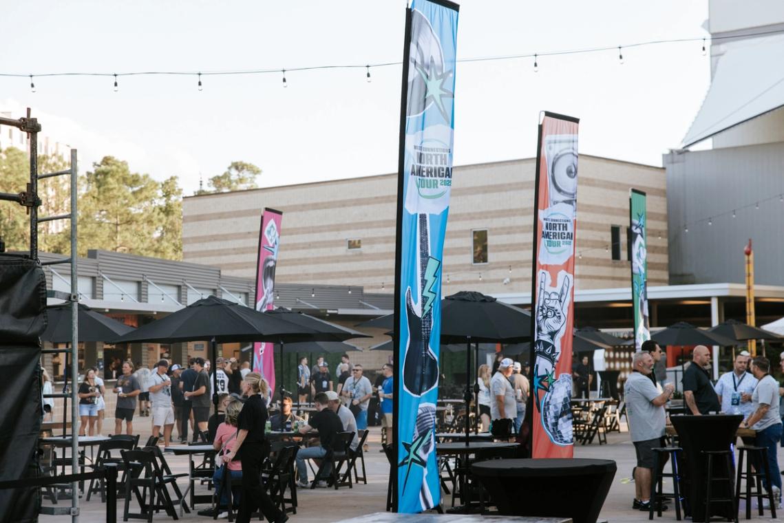 Feather banners lining the outdoor after-party