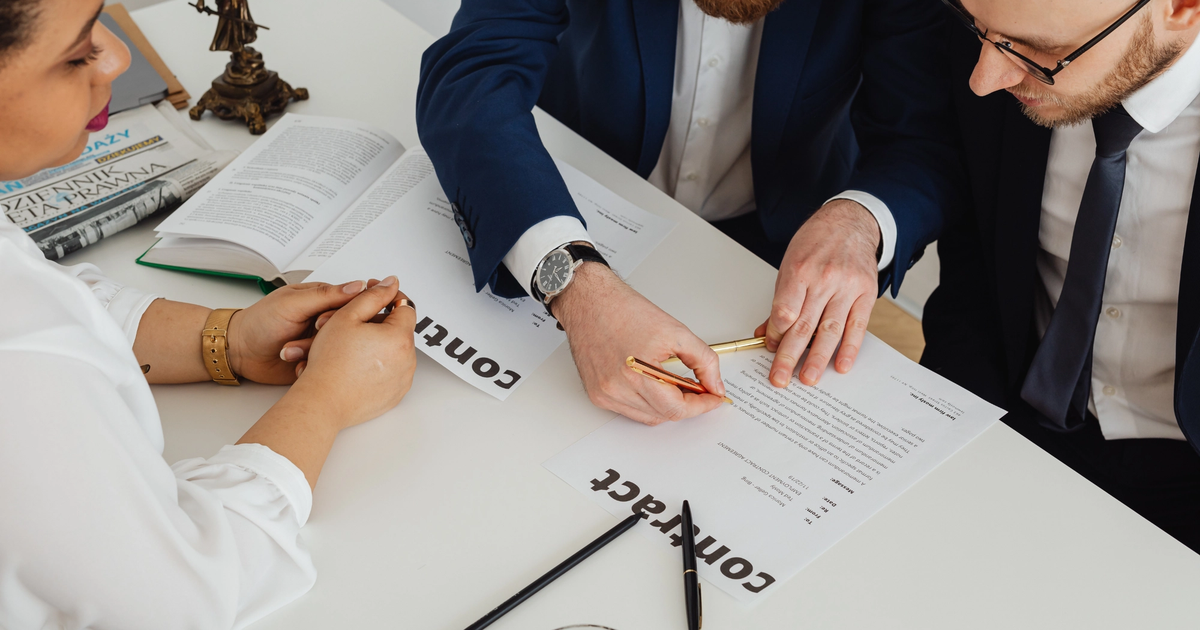 Business professionals reviewing their business energy contract. 