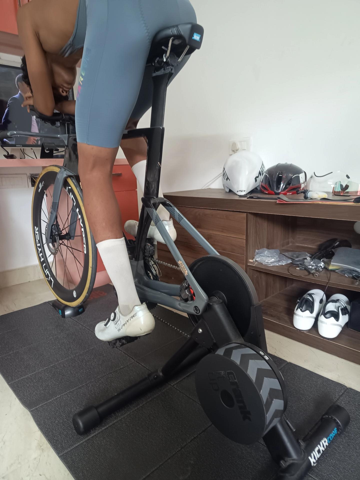 Juan pedalling his time-trial bike mounted on a Wahoo KICKR CORE indoor trainer.