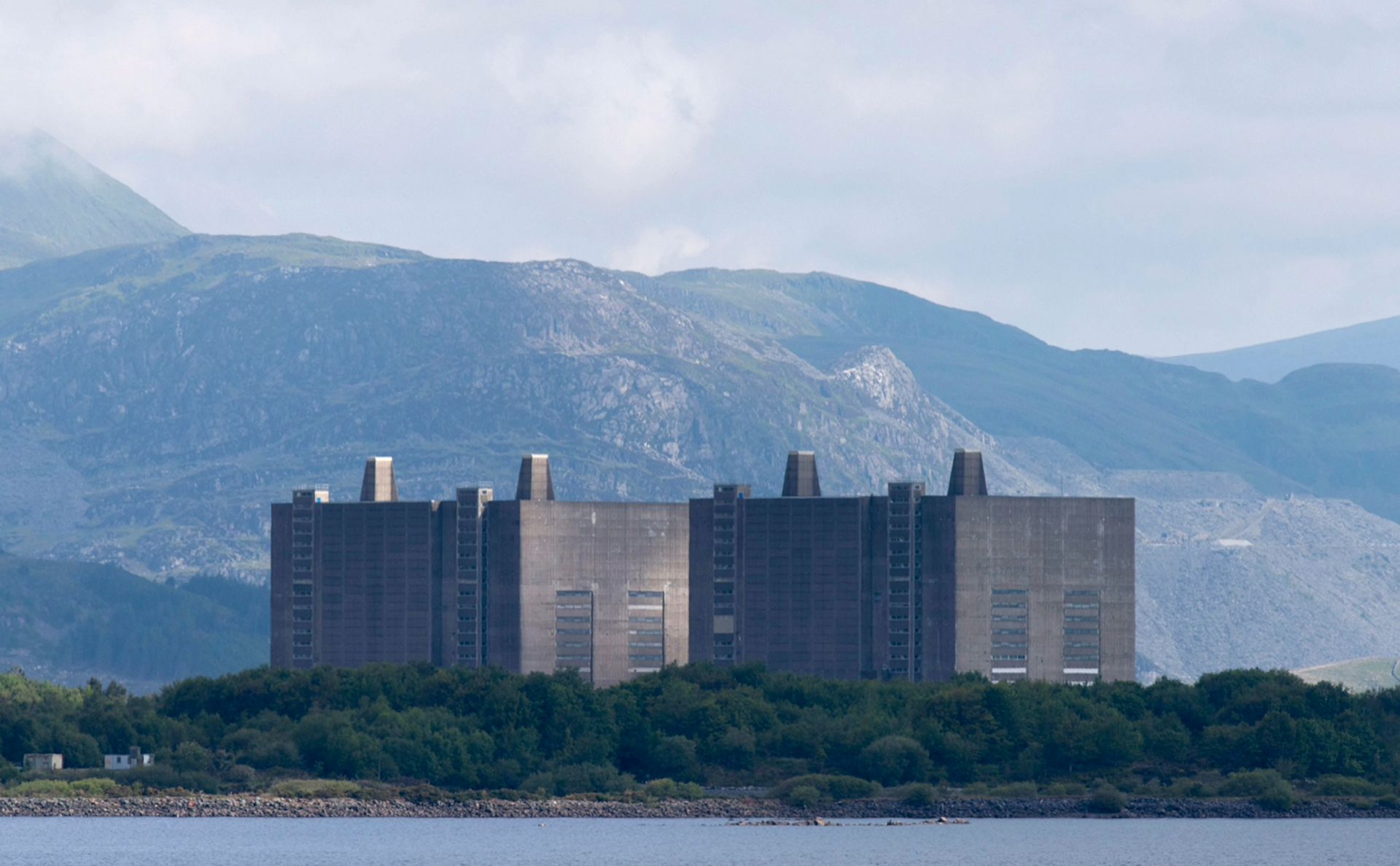 Designed by Basil Spence, Trawsfynydd Power Station was commissioned for the then-newly designated Snowdonia National Park in 1959. The site is expected to be returned to its ‘pre–nuclear’ state by 2083, 92 years after its closure.