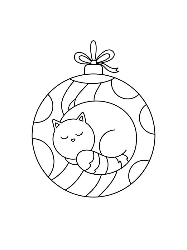 Sovende kat i en rund julekugle