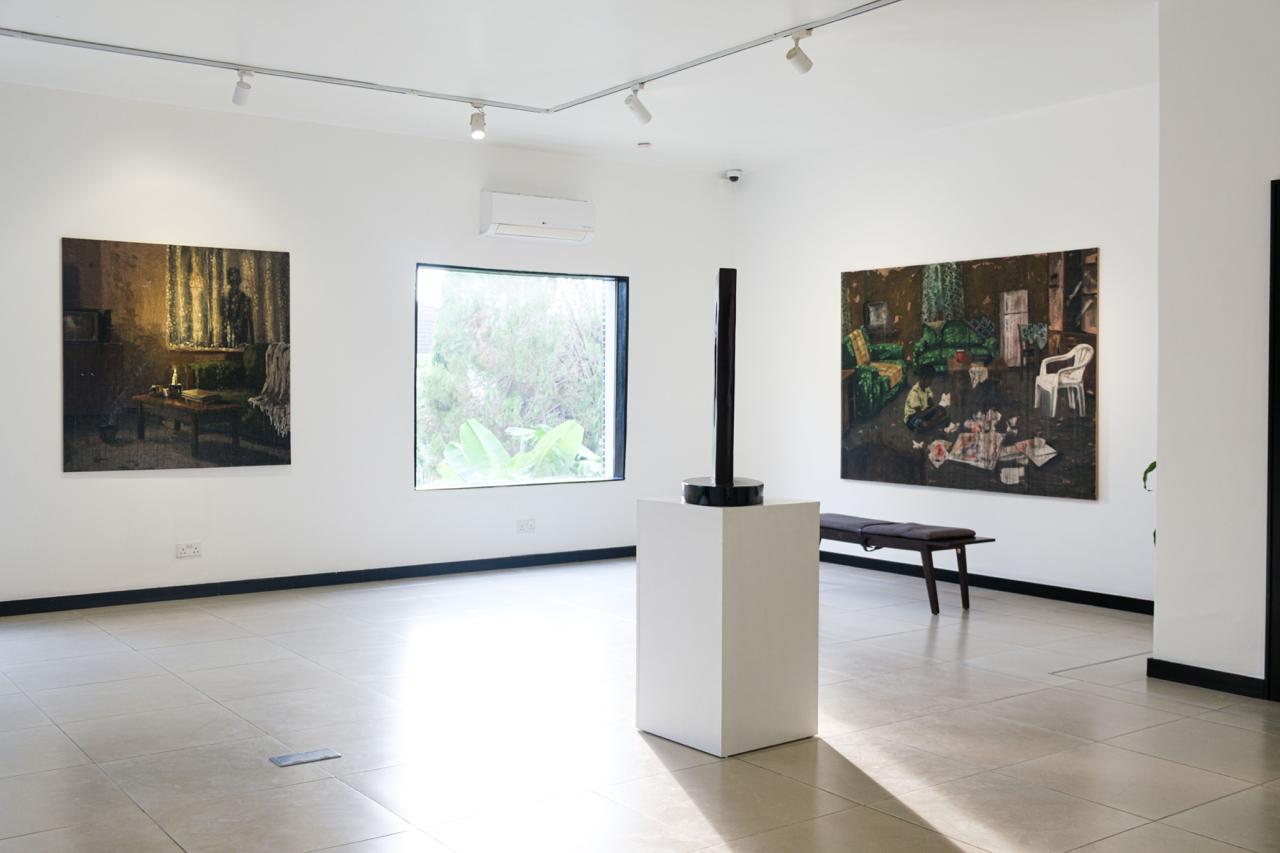 An exhibition hall featuring two art works