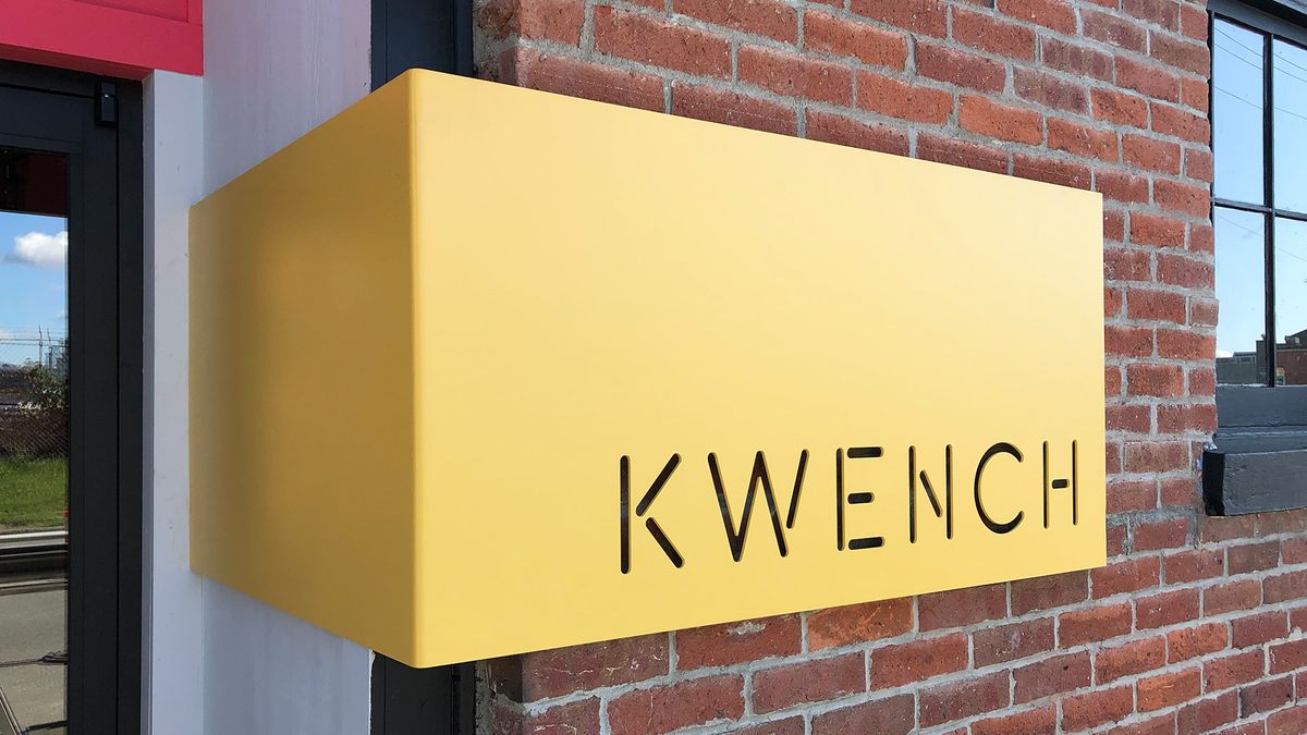 KWENCH office exterior signage, permanent, steel, powder coat