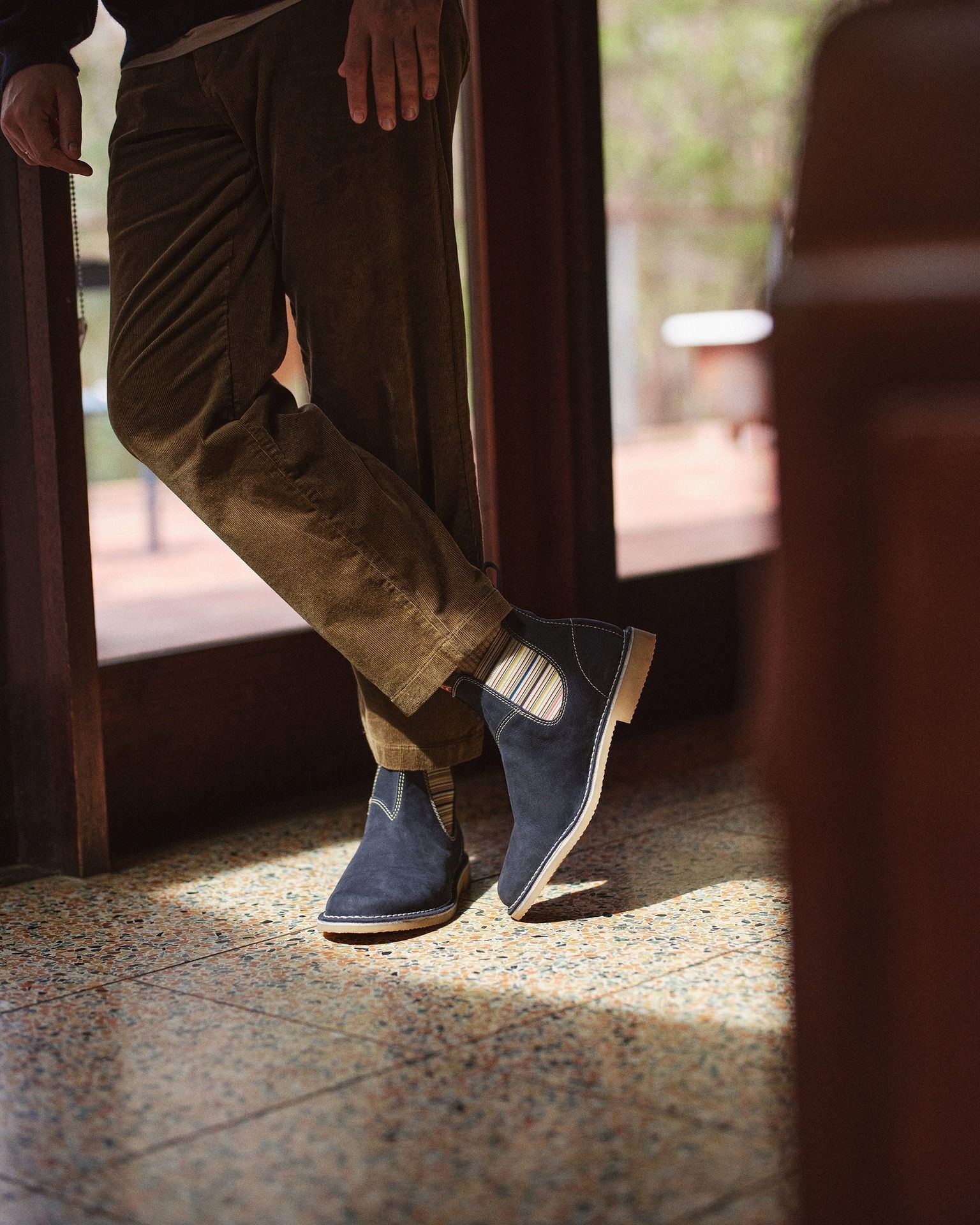 The Burnett effortlessly blends craftsma...

Combining Chelsea boot styling with desert boot comfort—make your mark in navy waterproof cow Nubuck, striped elastic sides that pop with detail, a crepe gum sole, with contrasting leather and woven Rossi pull tabs. They’re rugged where it matters, refined where it counts.

#RossiBoots