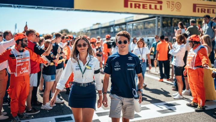 Senior Press Officer Dominique Heyer-Wright and Nyck de Vries walk along the track ahead of the Italian Grand Prix