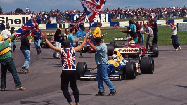 Mansell Mania reaches fever pitch as fans rush on to Silverstone Circuit, celebrating Nigel’s victory – 1992