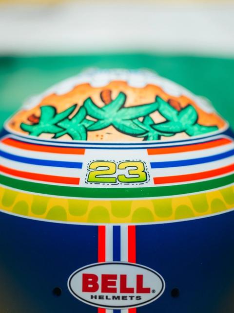 Alex’s #23 and the Thai flag are ever-present